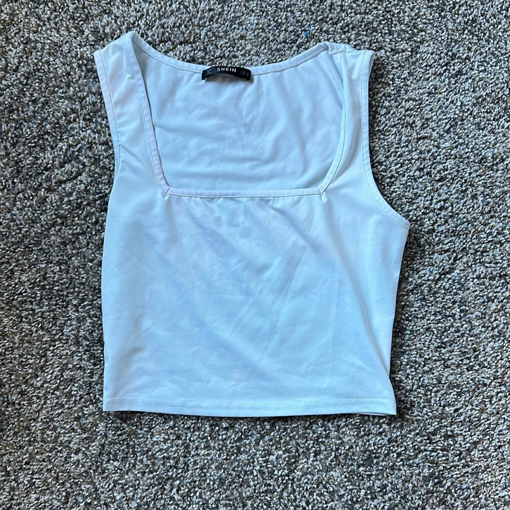 Light blue very see through tank top